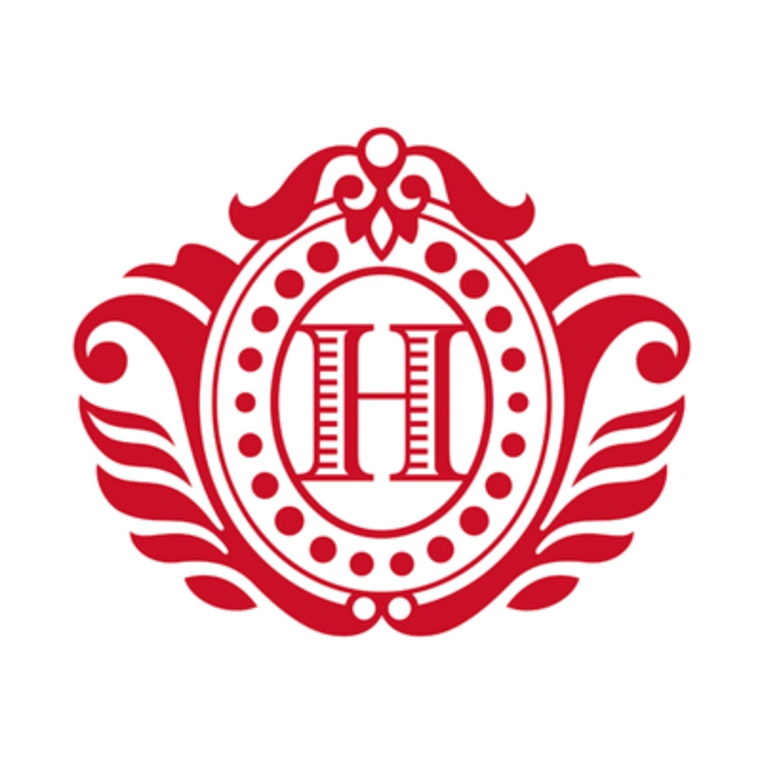Ornate red emblem featuring a central letter H within a decorative oval frame, surrounded by symmetrical floral and flourish designs on a white background.