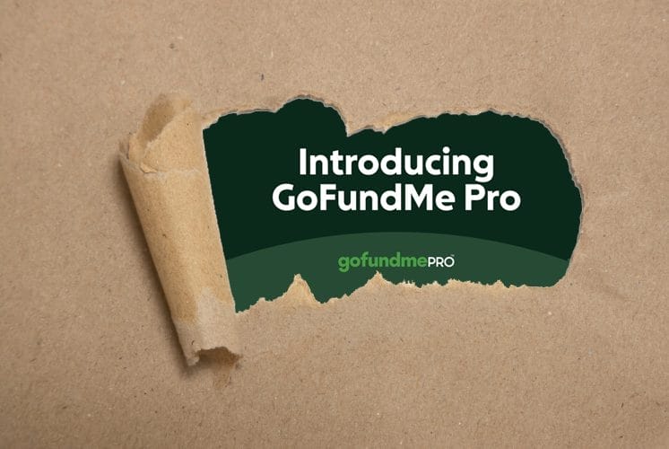 A piece of brown paper is torn back to reveal a dark green background with the text “Introducing GoFundMe Pro” and the GoFundMe Pro logo.
