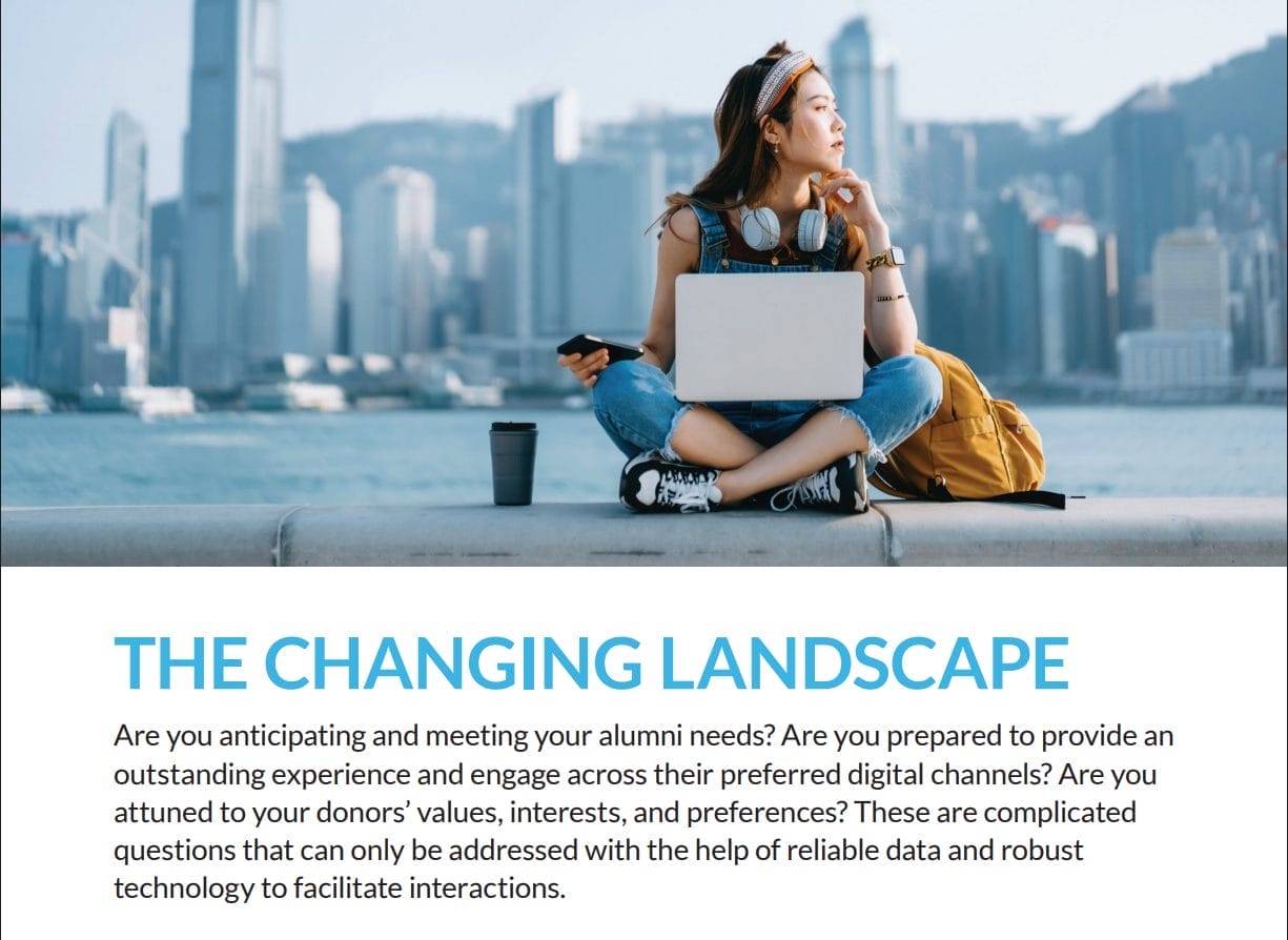A young woman sits outdoors with a laptop and coffee cup, looking to the side, city skyline behind her. The text highlights meeting alumni needs by adapting digital interactions with salesforce implementation best practices for higher education advancement teams.
